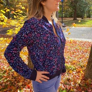 Lily Morgan vest with flower and zip. With pockets